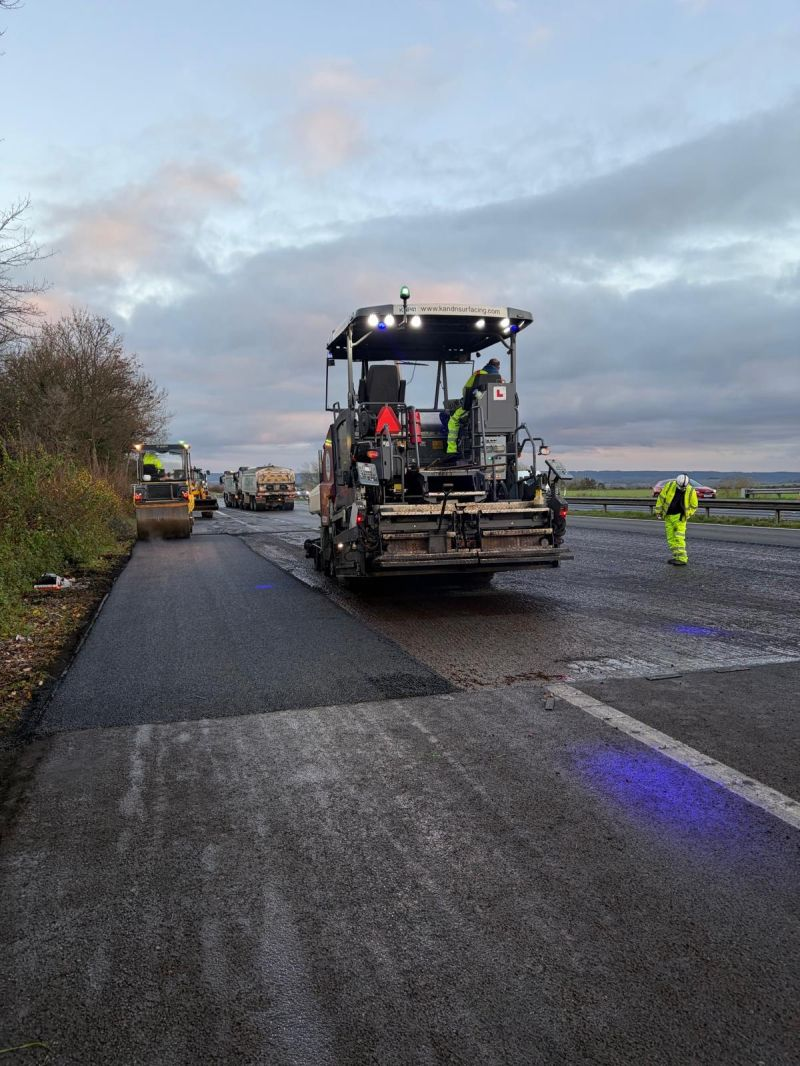 Night Time Road Maintenance Crew Repairing Asphalt
